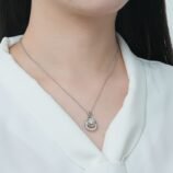 GLAMAVERA Elyenne Pendant 1CT moissanite infinity necklace in silver worn on the neck