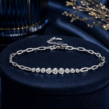 GLAMAVERA Kessane Bar Bracelet in 925 sterling silver displayed on a navy velvet jewellery stand