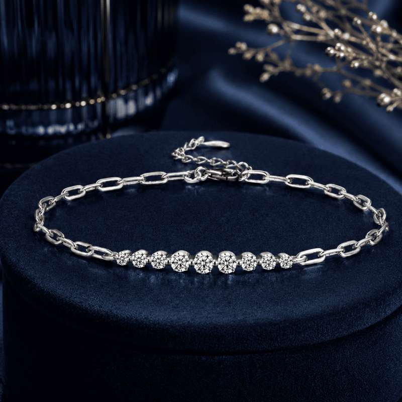 GLAMAVERA Kessane Bar Bracelet in 925 sterling silver displayed on a navy velvet jewellery stand