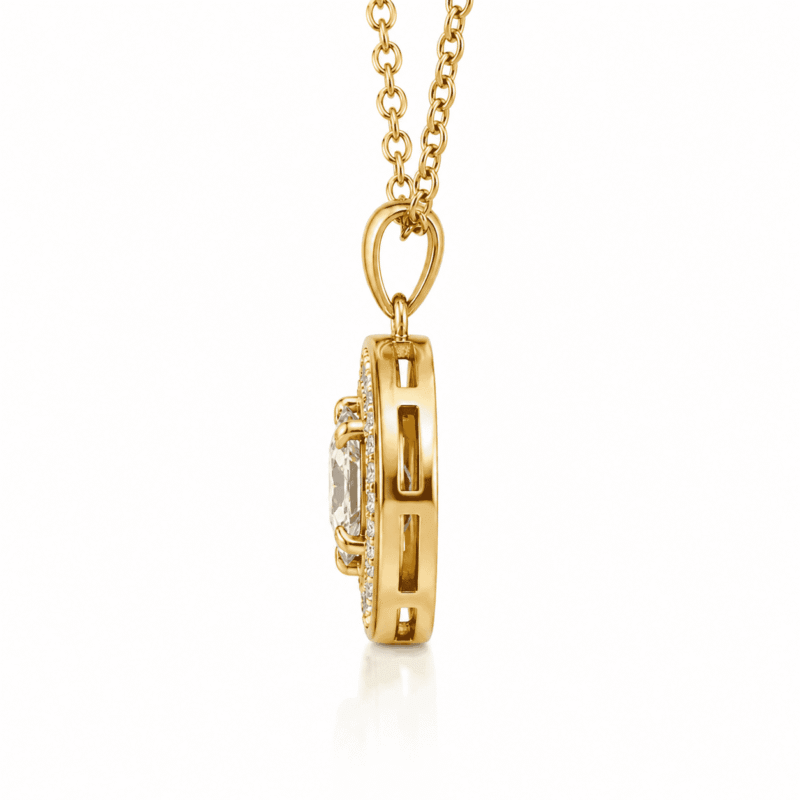 Side profile of the gold Lyrane Halo Pendant Necklace by GLAMAVERA, showing the pendant structure and raised stone setting