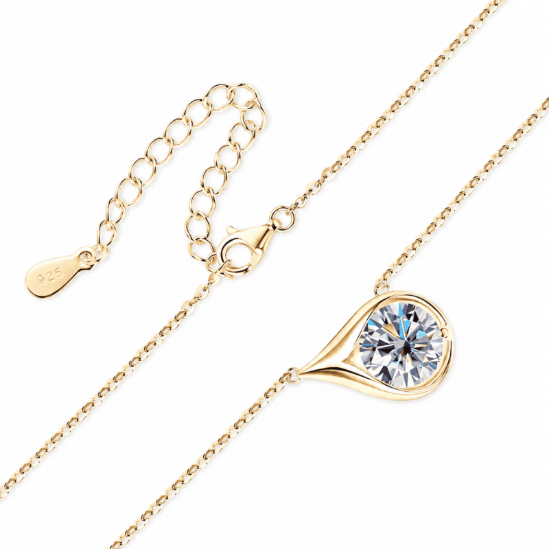 glamavera-velrose-droplet-necklace-gold-clasp Gold finish Velrose Droplet Necklace showing the moissanite pendant, lobster clasp and adjustable extension chain.