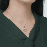 GLAMAVERA Elyenne Pendant 1CT moissanite infinity necklace in gold worn on the neck