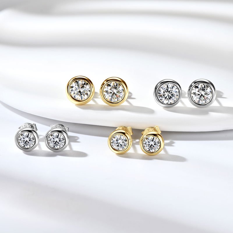 Matching Torvane gold and silver moissanite bubble stud earrings