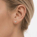 Torvane gold-tone moissanite bubble stud earring worn on the ear